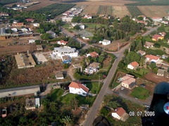 <p>A small cooperative farming village in Israel, but land is owned privately.</p>