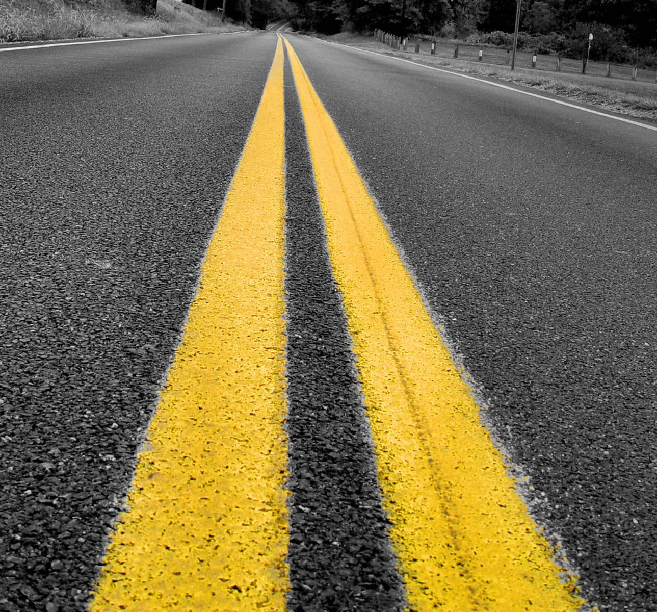 <p>The color means two-way traffic and the double line means no passing</p>