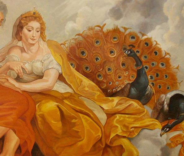 <p>Žena středního věku, vždy oblečená</p><p class="has-focus">Atributy: granátové jablko, páv</p>