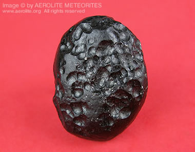 <p><span>Tektites are natural glassy bodies found in strewn fields across the globe. Which of the following statements correctly describes their origin and classification?</span></p>