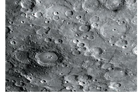 <ul><li><p>resembles moons highlands but craters less densely packed</p></li><li><p>no signs of clouds, rivers, dust storms, or other aspects of weather, recent or ancient</p></li><li><p>extensive smooth plains, widespread lava flows filled depressions</p></li></ul><p></p>
