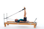 <p><strong>Setup</strong></p><ul><li><p>Setup: Lying supine in neutral spine position, legs straight, perpendicular to floor, hips externally rotated, feet in straps, plantarfexed</p></li><li><p>Resistance: light to medium | <strong>Springs: 1B or 1R</strong></p></li></ul><p><strong>Movement</strong></p><ul><li><p>Exhale: Lower leg</p></li><li><p>Inhale: Open leg and circle around, lift leg, return to start position</p></li></ul><p><strong>Muscle Focus</strong></p><ul><li><p>Hip extensors</p></li><li><p>Hip adductors</p></li></ul><p><strong>Objectives</strong></p><ul><li><p>Hip extensor strength</p></li><li><p>Hip adductor control</p></li><li><p>Pelvic lumbar stabilization</p></li></ul><p><strong>Cues</strong></p><ul><li><p>Focus on hip disassociation</p></li><li><p>Maintain pelvic lumbar stabilization</p></li><li><p>Draw straight line down center</p></li><li><p>Squeezing heels together</p></li><li><p>Draw two semi-circles back to back as legs circle around</p></li><li><p>Maintain consistent flow of movement</p></li></ul><p></p>