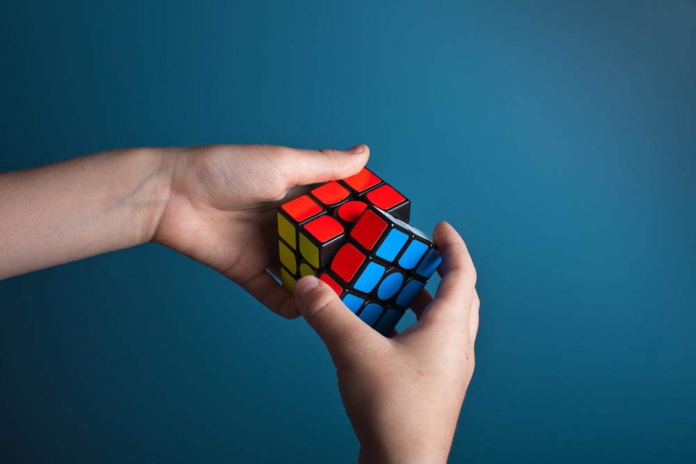 <p>Two departments disagree about how to solve a serious problem with an important project.</p><p>Use a phrasal verb to say they need to find a solution as soon as possible.</p>
