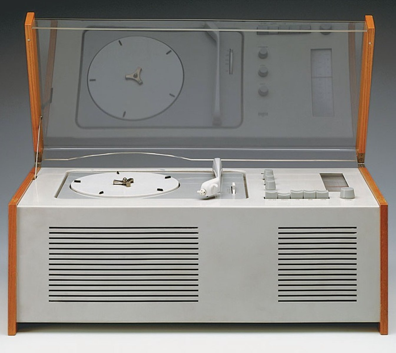 <p>QN=118</p><p>What is the name of this product?</p><p>Check one option.</p><p>a. Bluebird 566 radio designed by Walter Dorwin Teague for Sparton, 1935-36-with what Edgar Kauffman, Jr., called its "speed whiskers."</p><p>b. T24 portable transistor radio designed by Dieter Rams for Braun, 1956.</p><p>c. SK4 record player designed by Dieter Rams and Hans Gugelot for Braun, 1957, nicknamed "Snow White's Coffin."</p><p>d. TP1 portable radio and phonograph designed by Dieter Rams for Braun, 1959.</p>