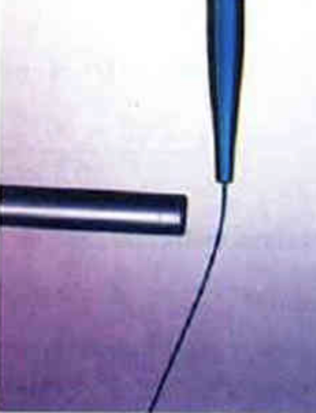 <p>Can you explain the attraction of water to the charged rod in the figure below?</p>