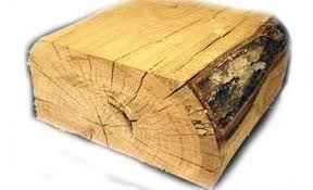 <p>areas where lumber has been cut too closely at edge of log and there is bark on boards</p>