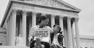 <p><span style="background-color: transparent;">On May 17, 1954 the landmark Supreme Court case Brown v. Board of Education of Topeka finally overturned the “separate but equal” doctrine in public education</span></p><ul><li><p><span style="background-color: transparent;">Unanimous decision read by Chief Justice Earl Warren.</span></p></li><li><p><span style="background-color: transparent;">After years of struggle, civil rights activists achieved a victory against the legal basis for de jure segregation.</span></p></li><li><p><span style="background-color: transparent;">Empowered Black Americans</span></p></li><li><p><span style="background-color: transparent;">Challenge to the South = resentment, defiance (since states have power over education). Some took 10 year to desegregate, closed schools, or opened religious white private schools (white flight to private schools)</span></p></li></ul><p>Reargument of Brown Case- added phrase “with all deliberate speed” to push integration of school</p><p>Clark Experiment- kids pick up white doll as good doll, black doll as “bad doll.” Damage to kids of racism</p><p>School busing </p><p><span style="background-color: transparent;">Putting integration into practice proved slow-going. </span></p><ul><li><p><span style="background-color: transparent;">In 1971, <em>Swann v. Charlotte-Mecklenburg Board of Education</em> forced districts to bus students to schools within and across school districts to speed up desegregation. </span></p></li><li><p><span style="background-color: transparent;">Even in north, mandatory school busing was controversial as white families did not want their children to be bused to Black schools and white flight to suburbs or private religious schools = de facto segregation </span></p></li></ul><p></p>