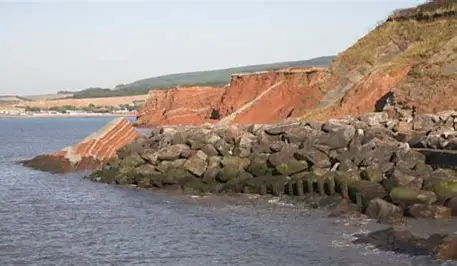 <ul><li><p>Piles of rock (usually granite) placed at foot of cliff to absorb and disperse sea energy</p></li><li><p>Adv : cheap, effective and look natural</p></li><li><p>Dis: can be shifted by waves and if done wrong could look unnatural </p></li></ul><p></p>
