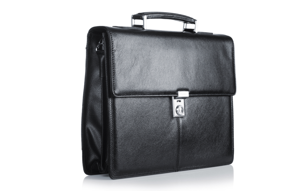 <p>Definition: is <mark>a flat, rectangular bag or case equipped with a handle, traditionally used for carrying business documents, papers, and books</mark>. Modern ….. are also designed to securely hold laptops, tablets, and other office essentials.</p>