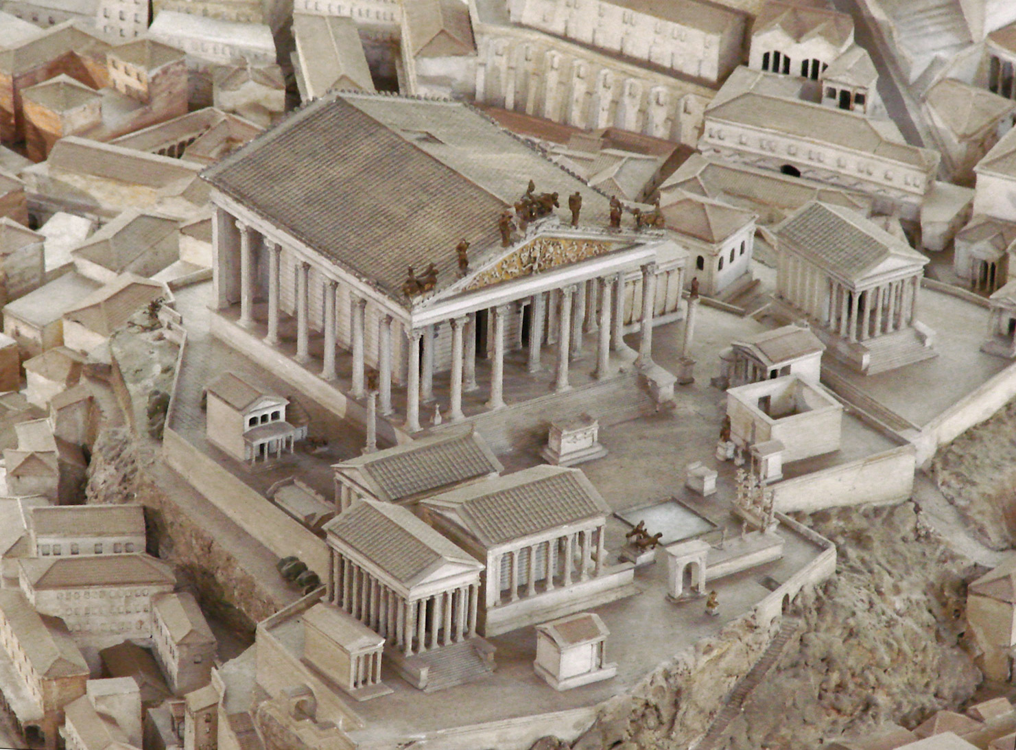 <p><span style="font-family: Aptos, sans-serif; line-height: 115%;">foot of the hill is where people think of as the center of Rome</span></p>