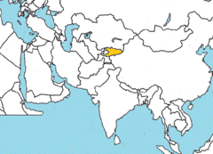 <p>east of Uzbekistan, west of the People's republic of China, and south of Kazakhstan</p>