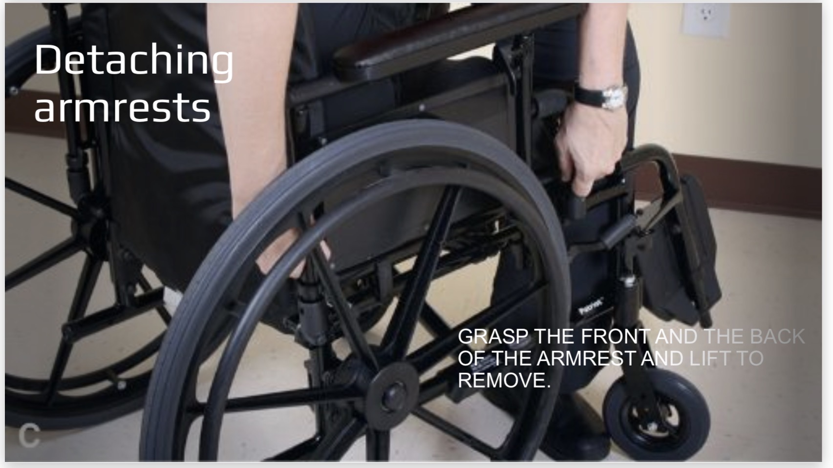 <p>Grasp the front &amp; back of the armrest simultaneously &amp; lift straight up</p>