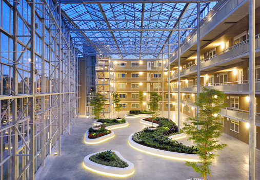 <p>An inside courtyard of a structure that may be either open at the top or covered with a roof.</p>