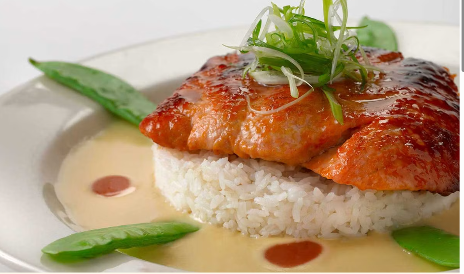<p>Fresh Miso Marinated Salmon Served with Snow Peas, White Rice and a Delicious Miso Sauce</p>
