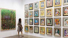 <p>triển lãm - nơi trưng bày tác phẩm (Example: The exhibition opens tomorrow. - Triển lãm khai mạc vào ngày mai.)</p>