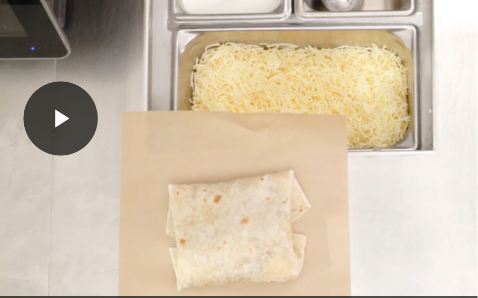 <p></p><p>1) place large bread on brown paper</p><p>2) ask to add add desired meat/protein, fajitas, shredded cheese</p><p>3) fold the bread on the brown paper</p><p>4) place both onto aluminum paddle</p><p>5) place into TurboChef machine</p><p>6) pull lever on side of machine &amp; press “quesadilla” on screen</p><p>7)<strong> add 3 sides</strong> onto tray (<strong>queso &amp; guac</strong> can be added for <strong>extra $$$</strong>)</p><p>8) after 30 sec, push lever of turbochef up, &amp; remove quesadilla &amp; paper with paddle</p><p>9) place on table &amp; cut diagonally with red cutter (green for veggie quesadilla).</p><p>10) place both halves on kids meal tray &amp; close tray</p>