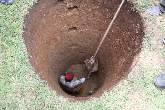 To make deep holes in the ground to get water. Example: The community dug wells for drinking water. | RU: рыть колодцы | KZ: құдық қазу