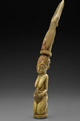 <ul><li><p>ashe (life force)</p></li><li><p>Olorun (supreme god)</p></li><li><p>Kneeling woman: pose suggests worship and supplication</p><ul><li><p>the idea that women have more magical power when they are nude, in a pure state</p></li></ul></li><li><p>hornbill: sacred bird, messengers between humans and the spirit world</p></li><li><p>ivory with dark wood inlay</p></li><li><p>tapped at the beginning of the ritual to get the attention of Eshu</p></li></ul><p></p>