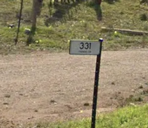 <p>White property markers</p>