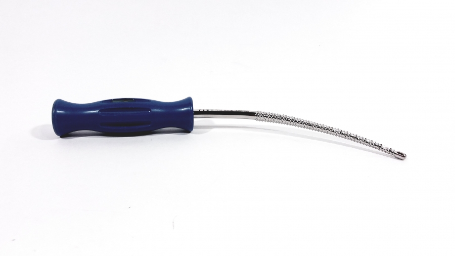 <p>Curved hand rasp; first pass to open and shape the femoral canal before broaching.</p>