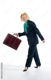 <p>The woman is carrying a briefcase.</p>