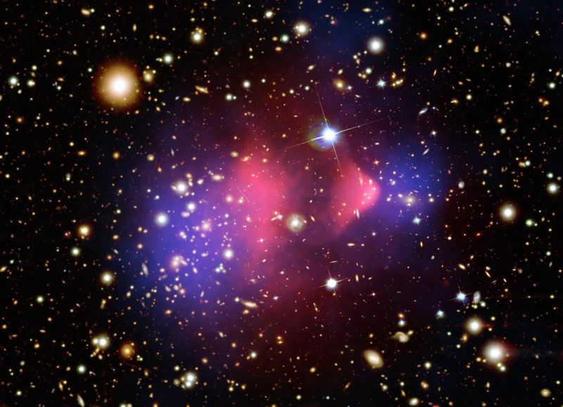 <p>This is an image of the "Bullet Cluster" of galaxies.&nbsp; An analysis of this image seems to confirm that ...</p><p>A. <span>dark matter surrounding a galaxy cluster directly interacts with all other matter (including normal luminous matter and other dark matter) by colliding with it.</span></p><p><span>B. dark matter surrounding a galaxy cluster directly interacts only with normal luminous matter.</span></p><p><span>C. dark matter surrounding a galaxy cluster passes through all other matter (including normal luminous matter and other dark matter) without directly interacting.</span></p><p><span>D. dark matter surrounding a galaxy cluster directly interacts only with other dark matter.</span></p>