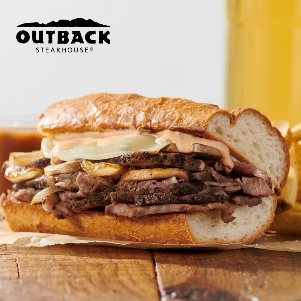 <p>tender slow roasted prime rib, grilled onions and mushrooms, provolone cheese, spivy bloom sauce, on toasted baguette, side of french onion au jus and creamy horseradish sacue</p>