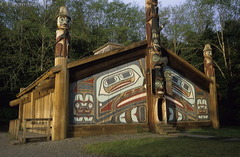 <p>Wooden Plank Houses with Totem Poles</p>