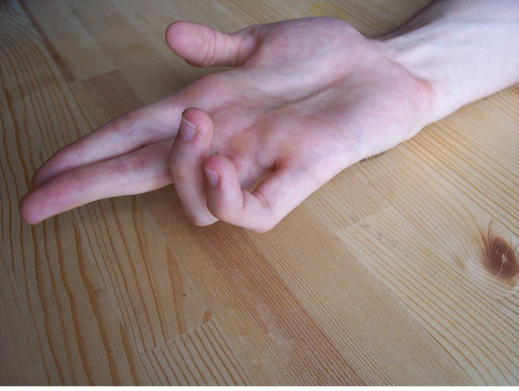<p>Clawing.</p>