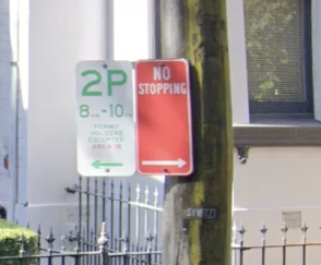 <p>Red “no stopping” signs</p>