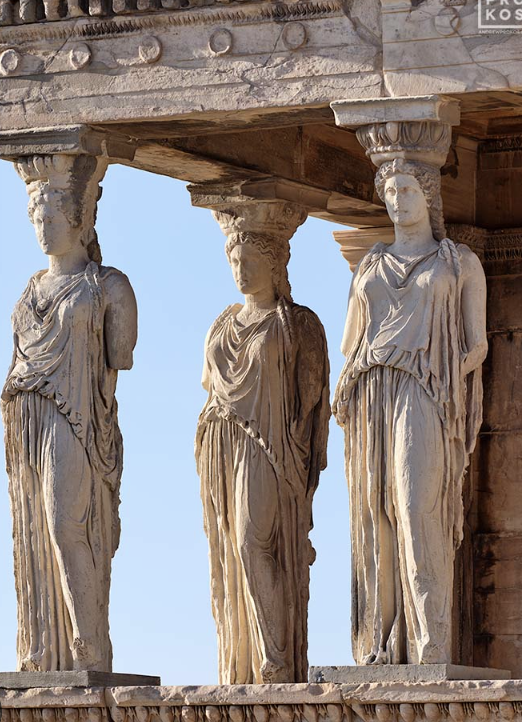 <p>Carved stone statue of a draped female figure, used as a pillar</p>