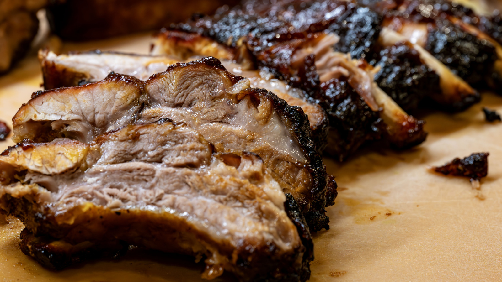 <p>chewy</p><p>(The meat was chewy because I overcooked it.)</p>
