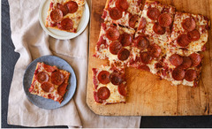 <p>Shredded mozzarella, pepperoni, and tomato sauce</p><p>*guests can decide whether sliced or not*</p><p>Modifications: no cheese</p><p>Allergens: dairy, garlic</p>
