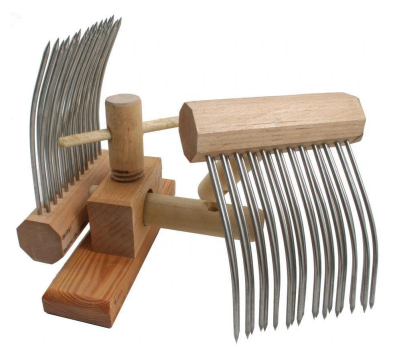 <p>comb type with two rows of curved teeth, used in pairs</p>