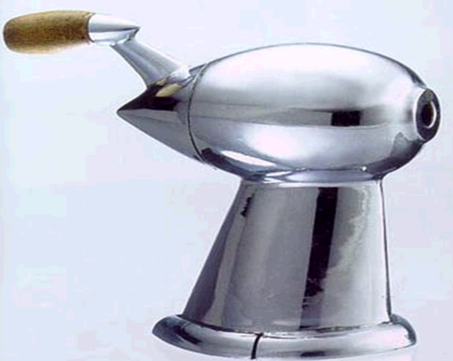 <p>In industrial design means shaping objects with <strong>smooth, rounded, aerodynamic forms</strong> to suggest <strong>speed, efficiency, and modernity</strong>. It began in the <strong>1930s</strong> for fast‑moving machines like trains, airplanes, and cars, but designers soon applied it to <strong>everyday objects</strong> like radios, clocks, vacuum cleaners, and even buildings (examples like the streamlined pencil sharpener(Loewy)).</p>