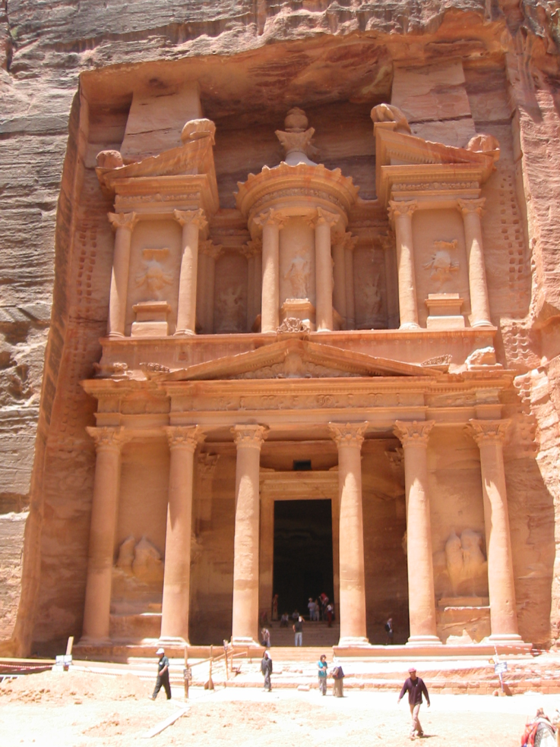 <p>The Background Of</p><p><em>Al-Khazneh</em> (the “Treasury”)</p><p>Rock-cut Mausoleum</p><p>Petra (Jordan)</p><p>2<sup>nd</sup> century</p>