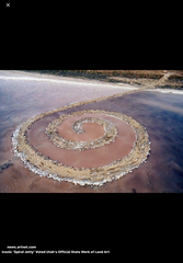 <p>In Spiral Jetty an example of Land Art by Robert Smithson, the spiral shape primarily creates:</p>