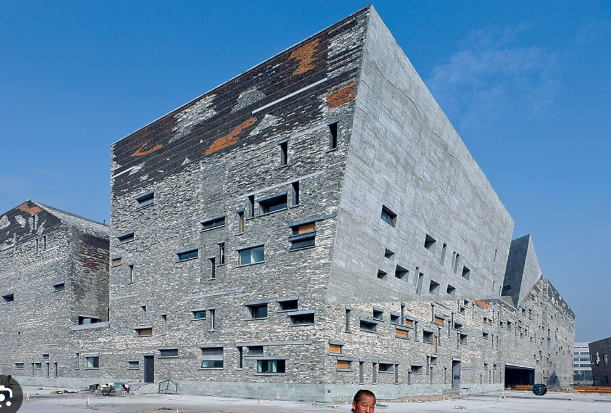<p>an approach to architecture that strives to counter the placelessness and</p><p>lack of identity of International Style Modernism, but also rejects the whimsical</p><p>individualism and ornamentation of Postmodern architecture. It seeks to provide an</p><p>architecture rooted in the modern tradition, but tied to geographical and cultural context.</p>