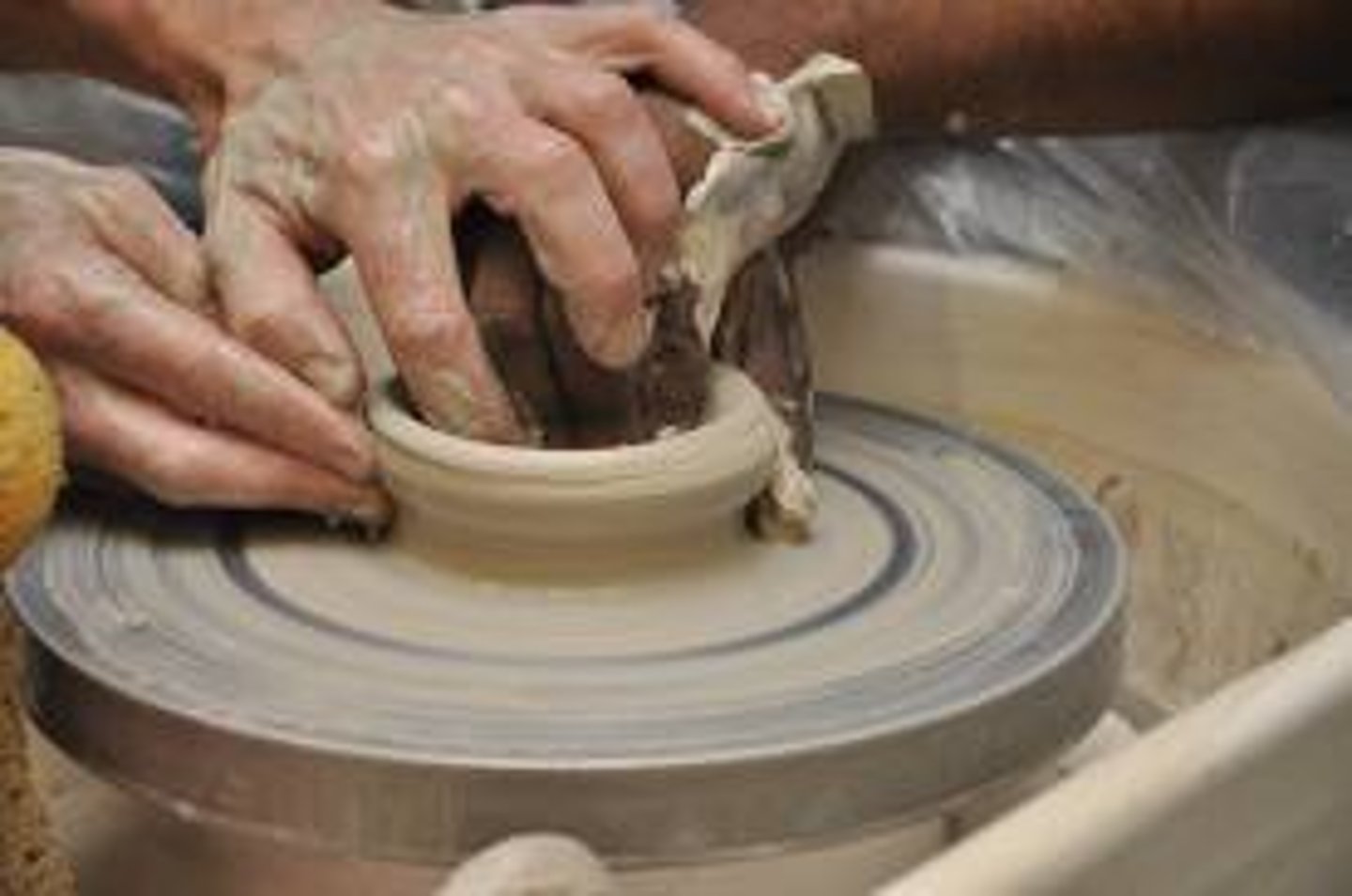 <p>doing pottery</p>