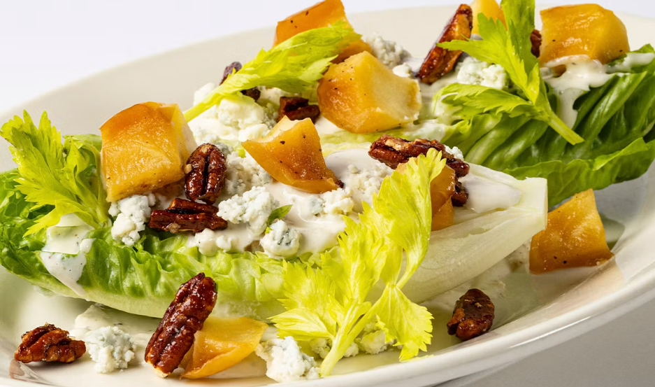 <p>Roasted Apples, Blue Cheese, Candied Pecans and Vinaigrette</p>