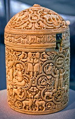 <p>Form:</p><p>-ivory</p><p>-carvings of text and pictures</p><p>-text used as a decoration</p><p>Content:</p><p>-roaring lions</p><p>-4 8-lobed medallions showing pleasure activities </p><p>-human and animal figures</p><p>-geometrical and vegetal motifs</p><p>Function:</p><p>-luxury cosmetic holder: text on top/decorated richly</p><p>-coming of age present from caliph to his younger son</p><p>Context:</p><p>-968 CE Umayyad, Muslim Spain</p>