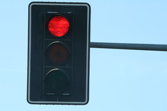 <p>- Stop completely (stop line, crosswalk, edge of sidewalk, edge of intersection)</p><p>- Wait until light is green and way is clear before proceeding</p><p>- May turn right if way is clear </p><p>- May turn left if moving from and to one-way road and way is clear</p>