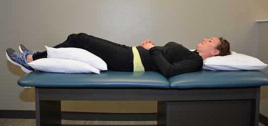 <ol><li><p>Pillow under head</p></li><li><p>Pillows or bolster under the knees</p></li></ol><p><em>This minimizes excessive lumbar lordosis!</em></p><p></p>