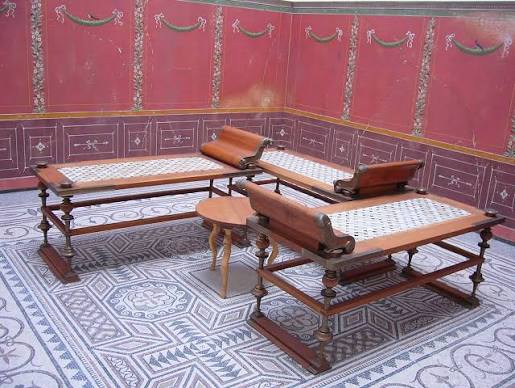 <p>dining room, named after the three part chaise lounge romans used to eat on</p>