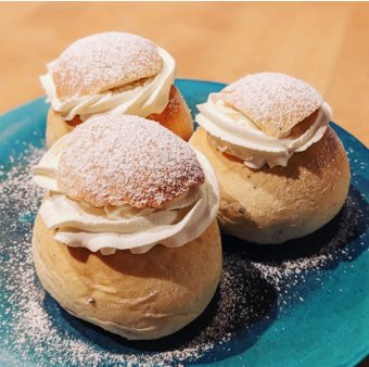 <p>slightly sweet cardamom flavored roll traditionally filled with almond paste and topped with fresh whipped cream. Many variations including orange curd, chocolate, coconut pastry cream, lemon lavender, etc. </p>