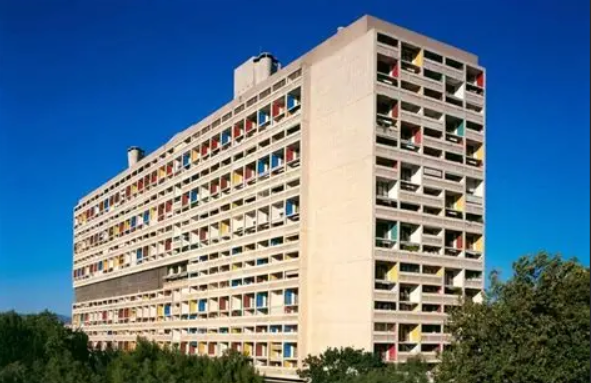 <p>the raw concrete. It is concrete left exposed after the formwork is removed, often showing the texture or grain of the wooden molds. The surface is not polished or covered, so the material appears natural and unfinished. (example like Le Corbusier Unite d’Habitation)</p>