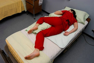 <p>patient is again side-lying but the lower arm is behind the patient and the upper arm is flexed at the shoulder and the elbow</p><p>body weight is on the anterior aspects of the humerus, clavicle, and ileum</p>