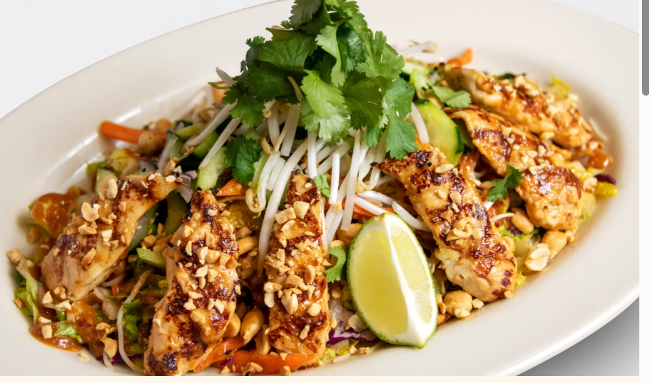 <p>Satay Chicken Strips, Lettuce, Carrots, Rice Noodles, Cucumbers, Bean Sprouts, Cilantro, Peanuts and Sesame Seeds Tossed with Thai Vinaigrette</p>