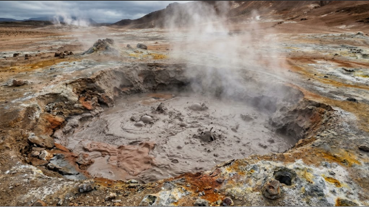 <p>What term/concept is being visualized in this image?</p><p>Definition: Geothermal features where acidic gases chemically break down surrounding solid rock into a bubbling slurry of clay and mud.</p>