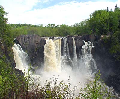 <ul><li><p>the waterfalls are at the same height —> has the same potential difference</p></li><li><p>there is a different amount of water flowing in each —> current changes in each resistor </p></li></ul><p></p>